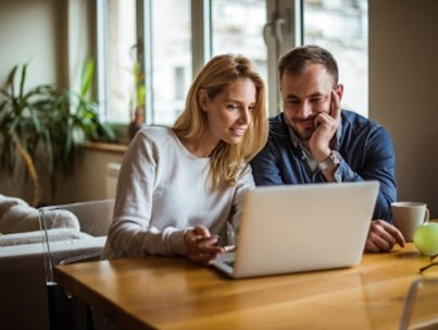 couple using a laptop