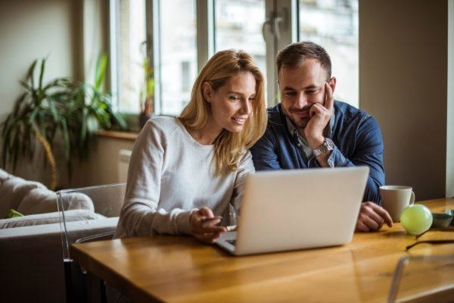 Couple using a laptop